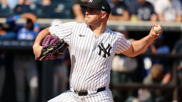 Feb 25, 2024; Tampa, Florida, USA; New York Yankees starting pitcher Carlos Rodon (55) throws a pitch during the first inning against the Toronto Blue Jays at George M. Steinbrenner Field.